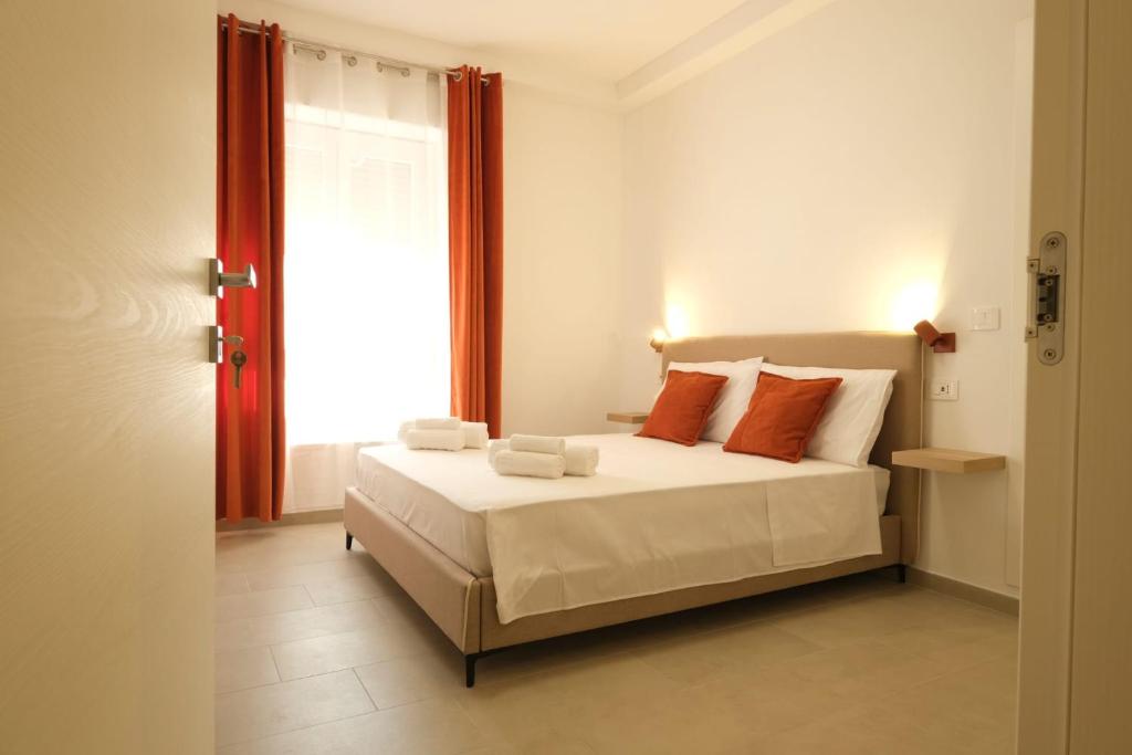 Postel nebo postele na pokoji v ubytování Marephis Rooms - Alghero