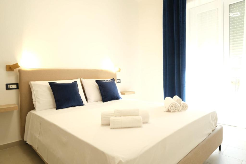 Postel nebo postele na pokoji v ubytování Marephis Rooms - Alghero
