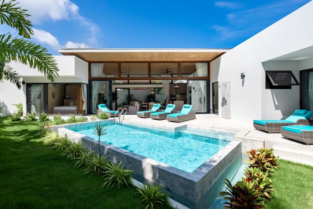 an image of a house with a swimming pool at Samudo 3br Tropical Haven in Bophut