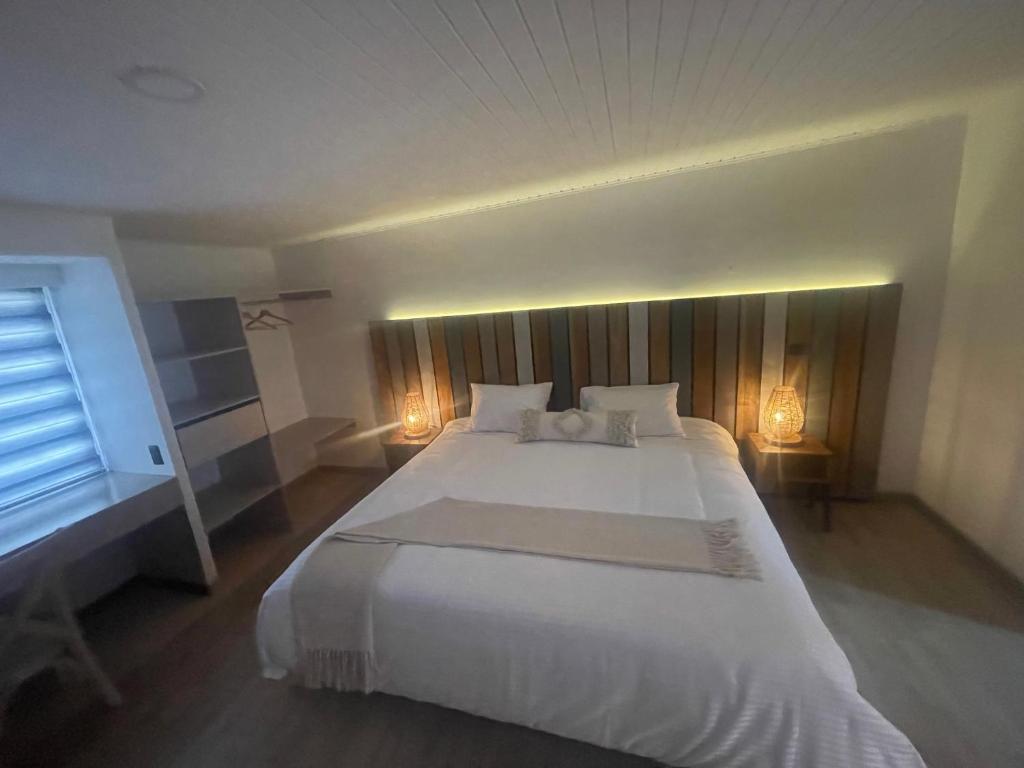 Postel nebo postele na pokoji v ubytování Marbore hotel & Spa
