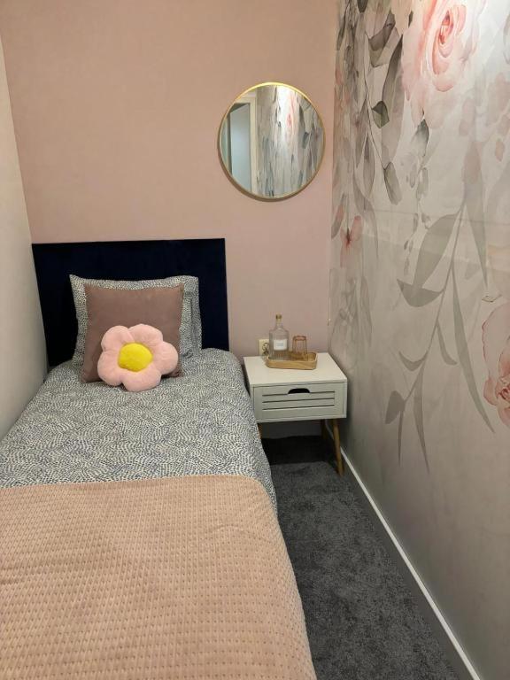 Postel nebo postele na pokoji v ubytování SheSpace Apartrooms