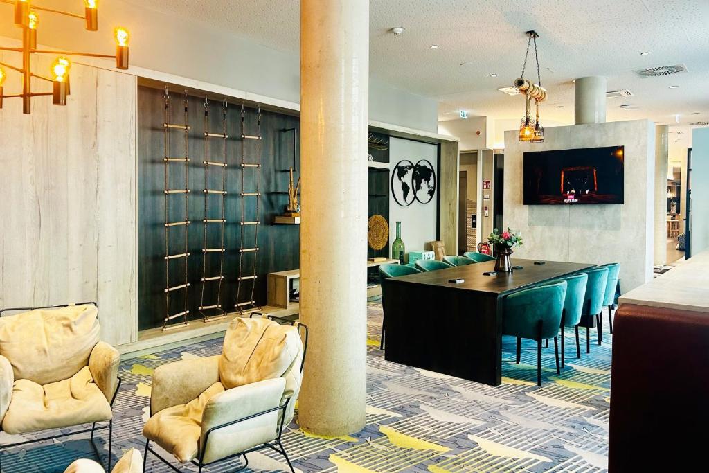 Posezení v ubytování Holiday Inn - the niu, Yen Hamburg City by IHG