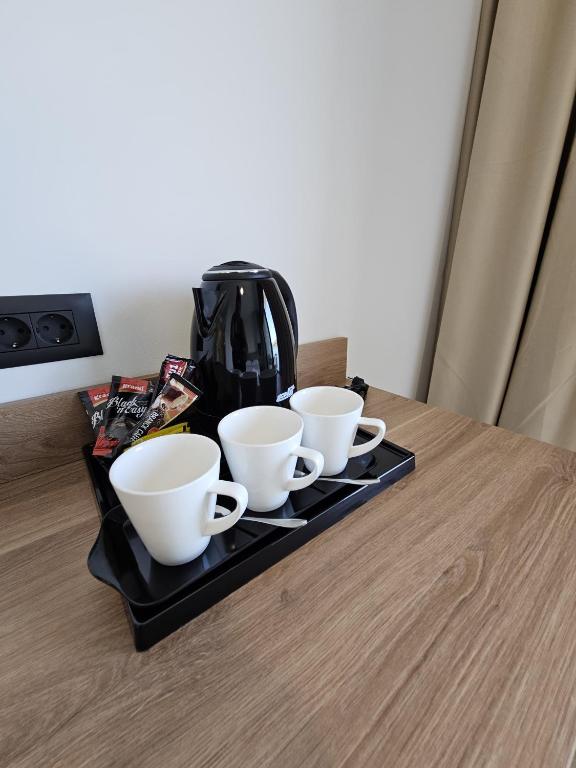 Příslušenství pro přípravu čaje a kávy v ubytování Apartmani Leženić M