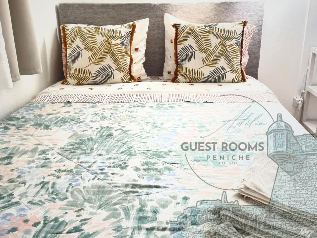 Postel nebo postele na pokoji v ubytování Historic House in Downtown Peniche