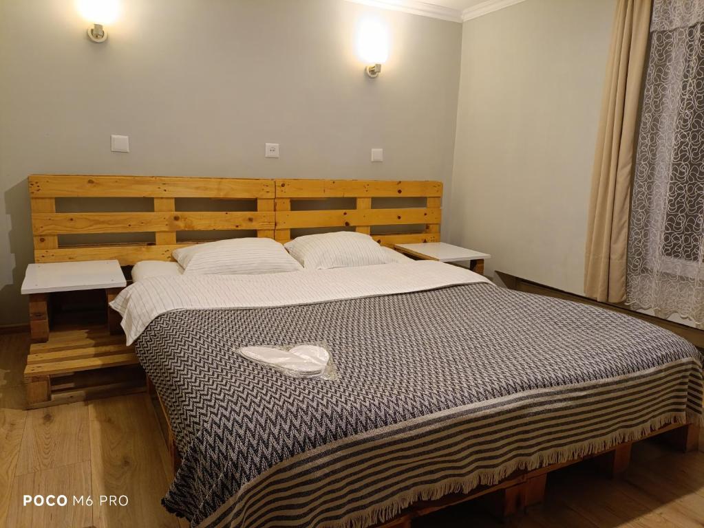 Ένα ή περισσότερα κρεβάτια σε δωμάτιο στο Welcome Guests