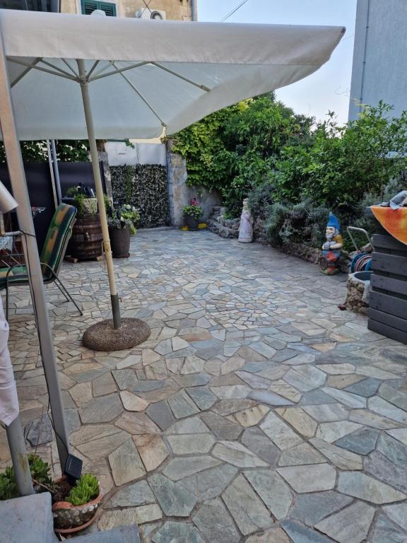 Patio nebo venkovní prostory v ubytování Apartments Mali Raj