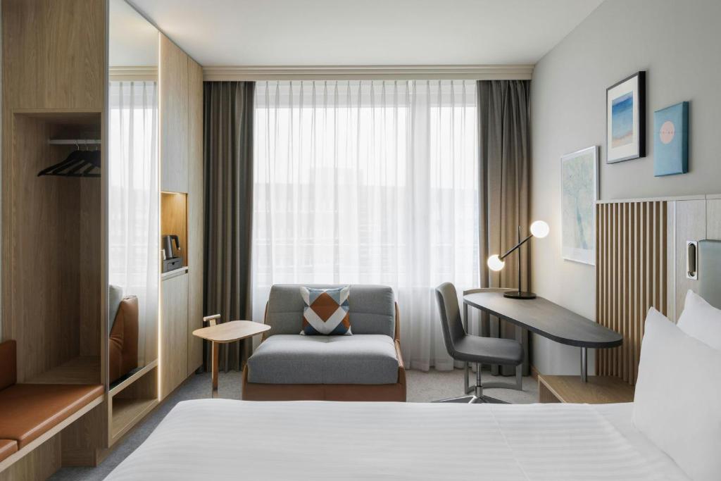 Postel nebo postele na pokoji v ubytování Courtyard by Marriott Zurich North