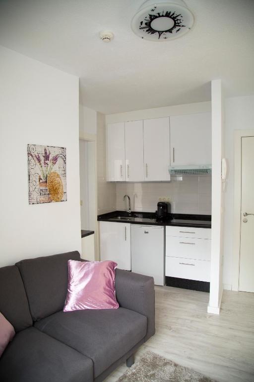 Kuchyňa alebo kuchynka v ubytovaní Xavestre Rooms Santiago