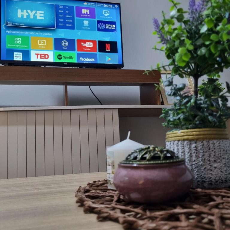 TV a/nebo společenská místnost v ubytování Maravilloso Estudio - Excelente Ubicacion