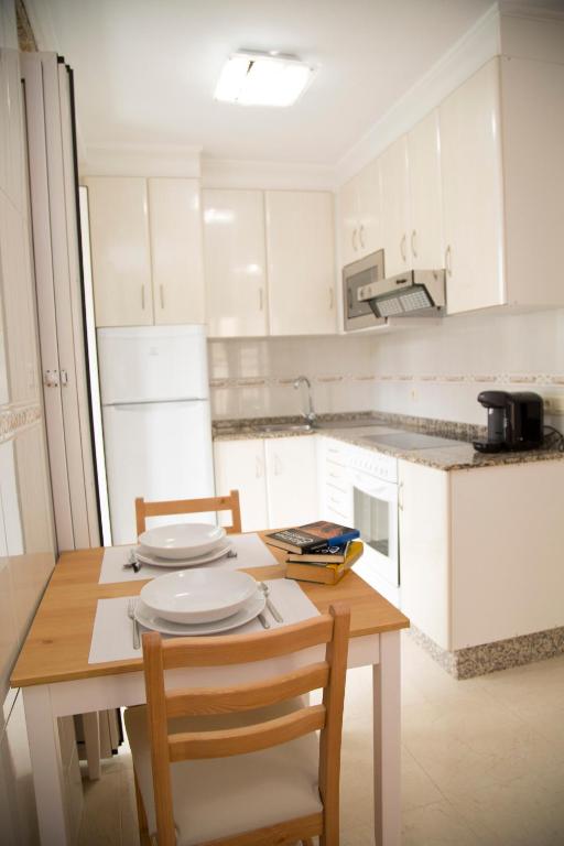 Kuchyňa alebo kuchynka v ubytovaní Xavestre Rooms Santiago