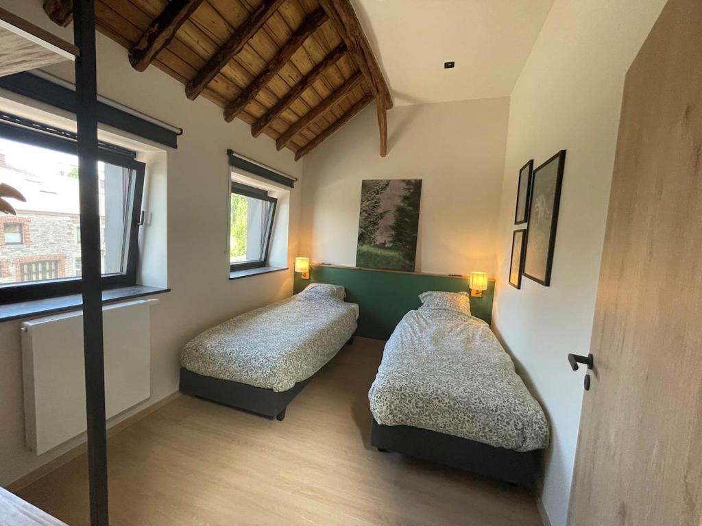 Postel nebo postele na pokoji v ubytování Gîte La Chouette