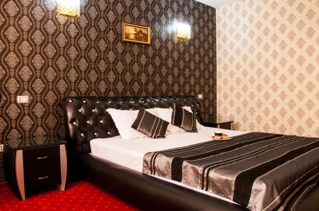 Postel nebo postele na pokoji v ubytování Hotel Boutique Shine