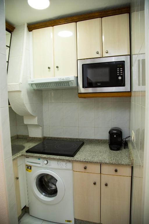 Kuchyňa alebo kuchynka v ubytovaní Xavestre Rooms Santiago