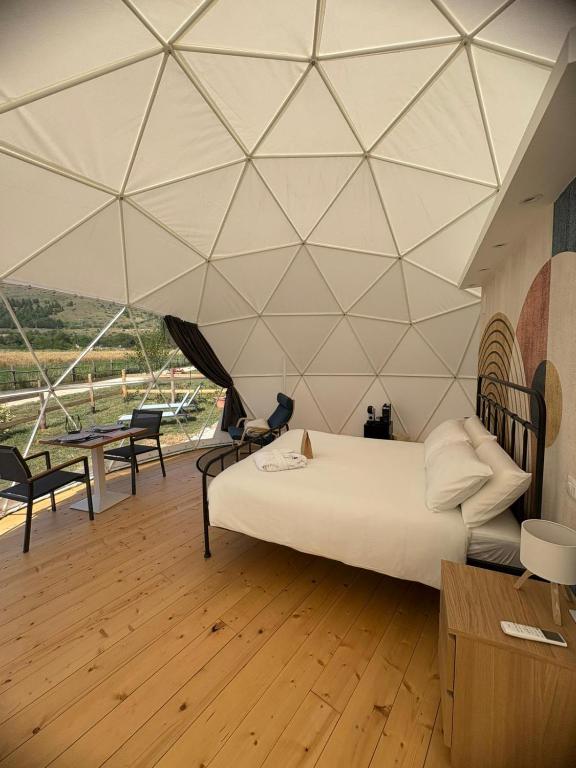 Postel nebo postele na pokoji v ubytování Glamping Monte Velino