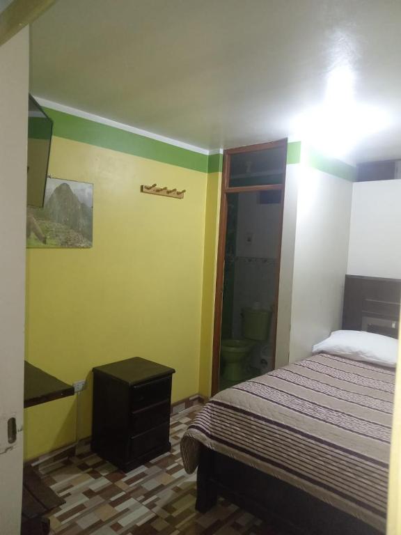 Postel nebo postele na pokoji v ubytování Waylla Hostel