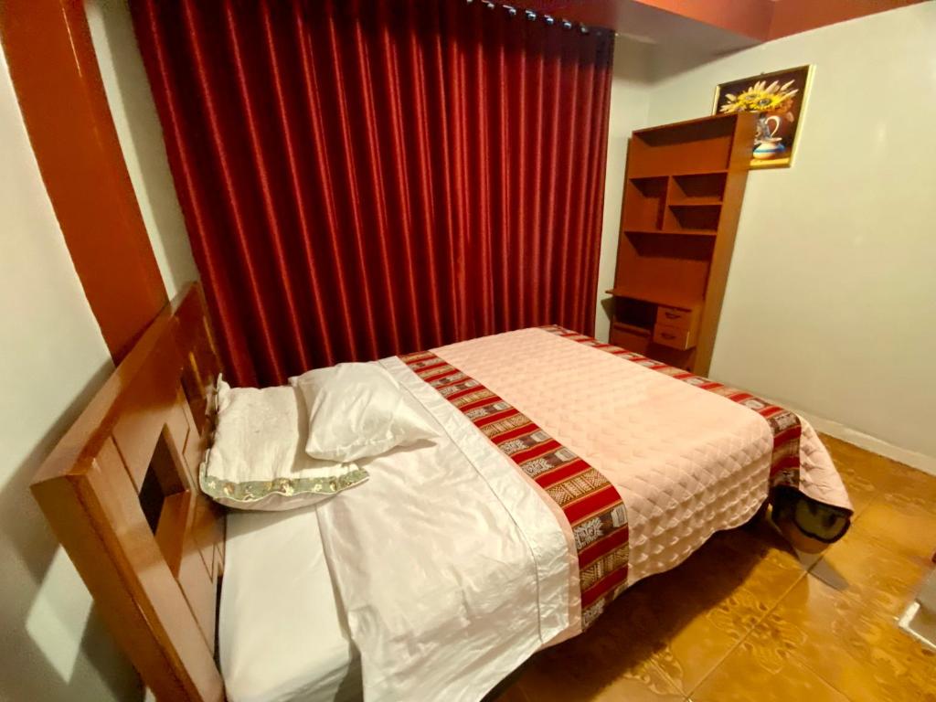 Postel nebo postele na pokoji v ubytování Nido Cusqueño