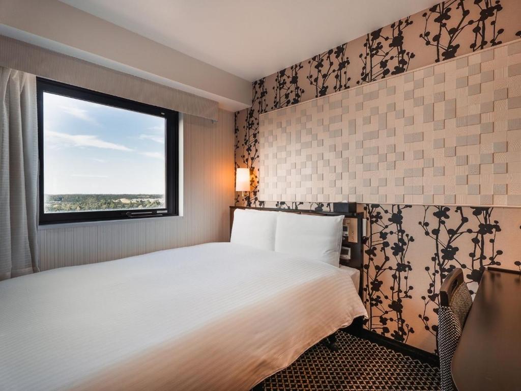 Postel nebo postele na pokoji v ubytování Graces Hotels