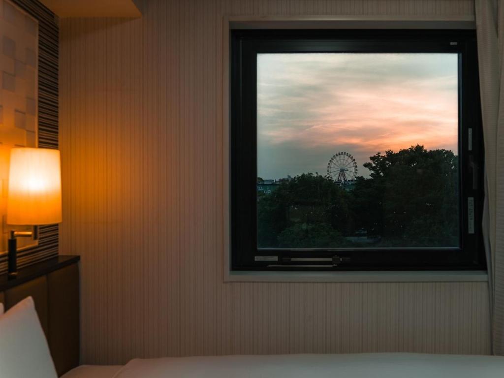 Postel nebo postele na pokoji v ubytování Graces Hotels