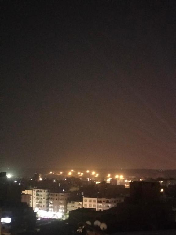 Nespecifikovaný výhled na destinaci Káhira nebo výhled na město při pohledu z hotelu