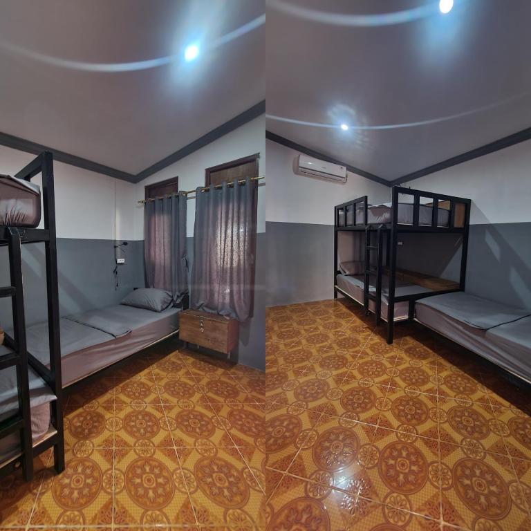 Postel nebo postele na pokoji v ubytování Bintang Guesthouse