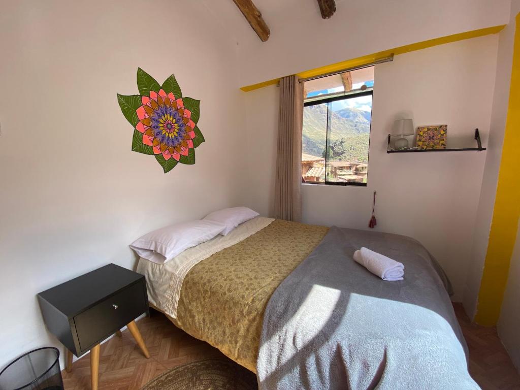 Postel nebo postele na pokoji v ubytování Colibri Wasi Pisac