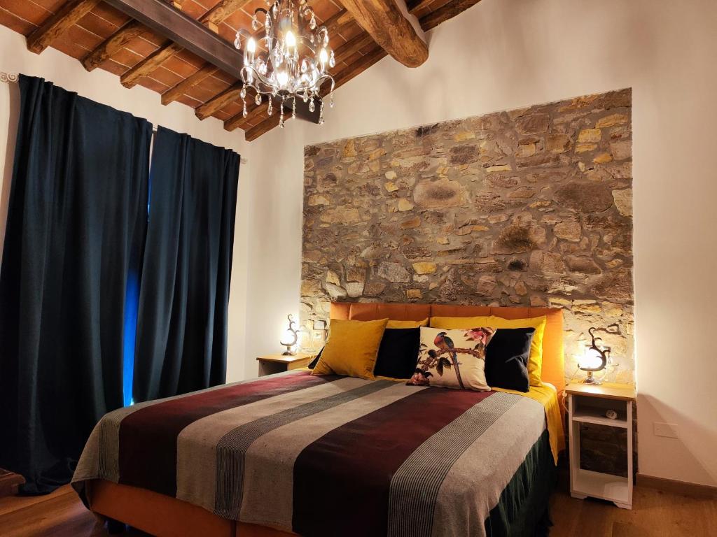 Postel nebo postele na pokoji v ubytování B&B Toringo