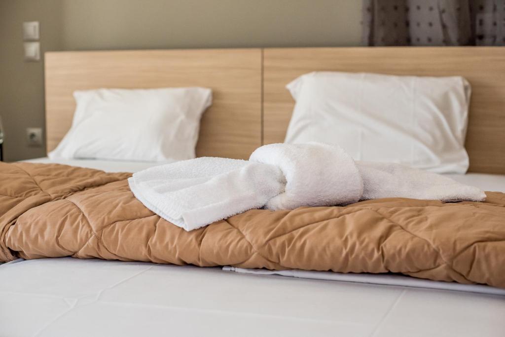 Postel nebo postele na pokoji v ubytování Golden Sun Villas