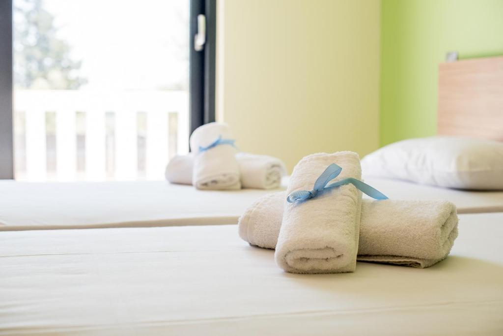 Postel nebo postele na pokoji v ubytování Golden Sun Villas