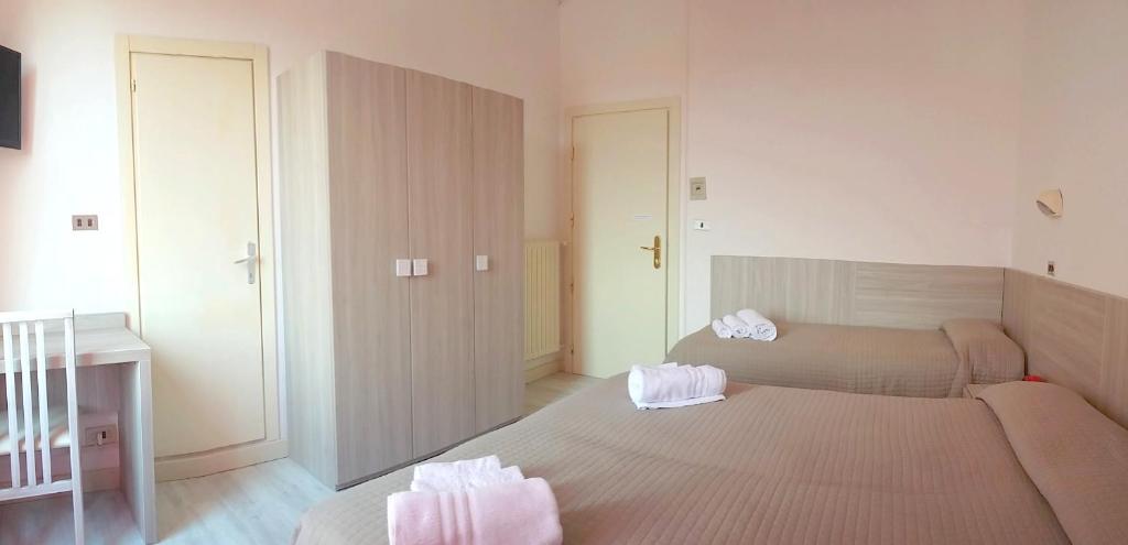 Postel nebo postele na pokoji v ubytování Hotel Verde Luna