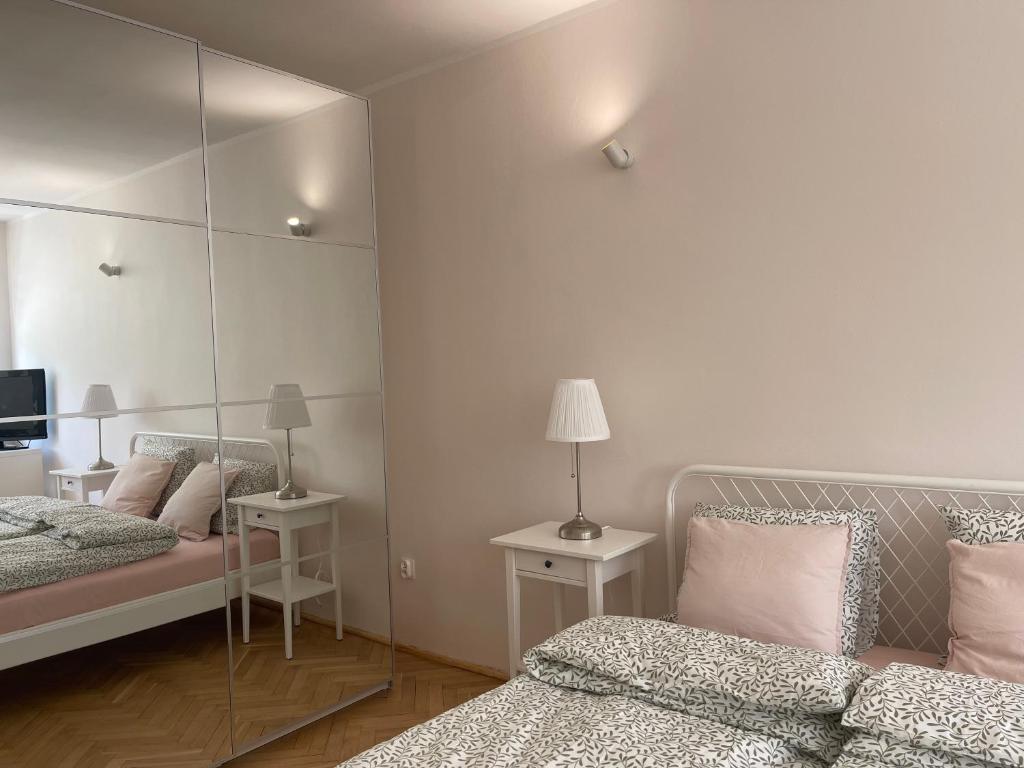 Posteľ alebo postele v izbe v ubytovaní Apartamenty Przy Plaży Gdynia Orłowo