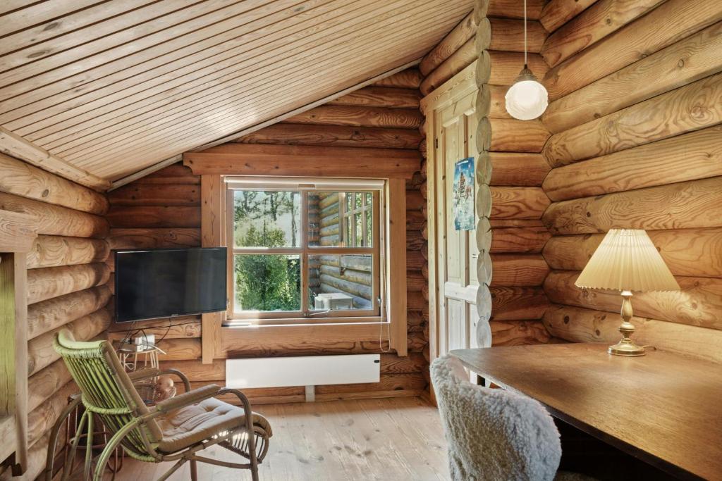 Fotografie z fotogalerie ubytování Nordic Log Cabin With Views Over The Fields v destinaci Hals