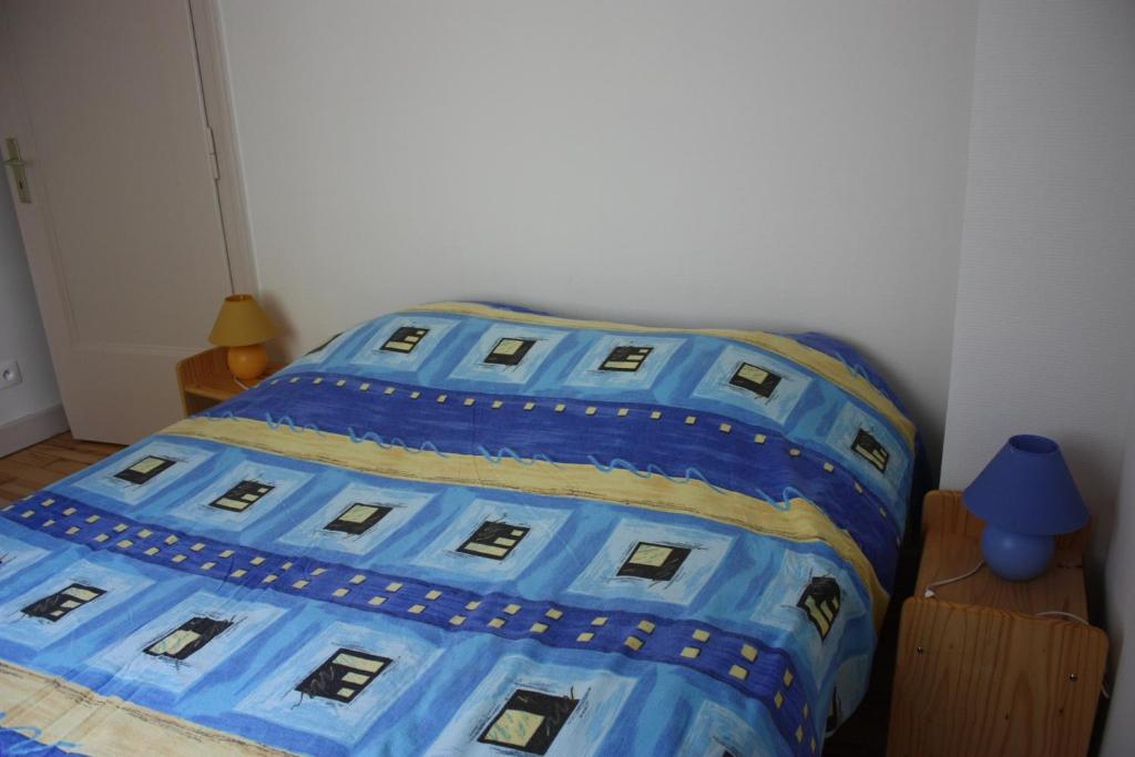 Postel nebo postele na pokoji v ubytování Gîte du moulin