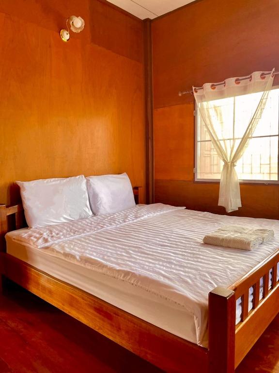 Postel nebo postele na pokoji v ubytování Le Moon Hotel