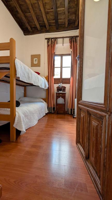 Postel nebo postele na pokoji v ubytování Dar Ar Nur Albaycin