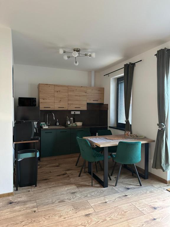 Kuchyň nebo kuchyňský kout v ubytování Apartmán Losonci