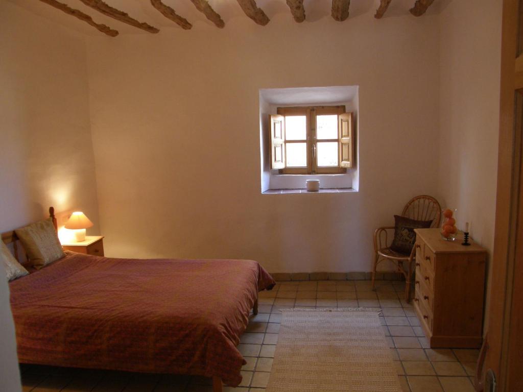 Postel nebo postele na pokoji v ubytování Cortijo Romero