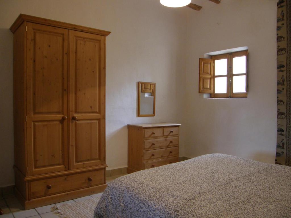 Postel nebo postele na pokoji v ubytování Cortijo Romero