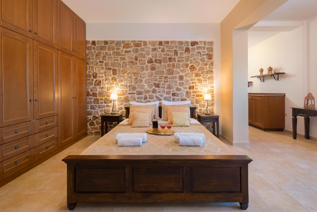 A bed or beds in a room at Butterfly Villa with stunning Sea and Valley Views