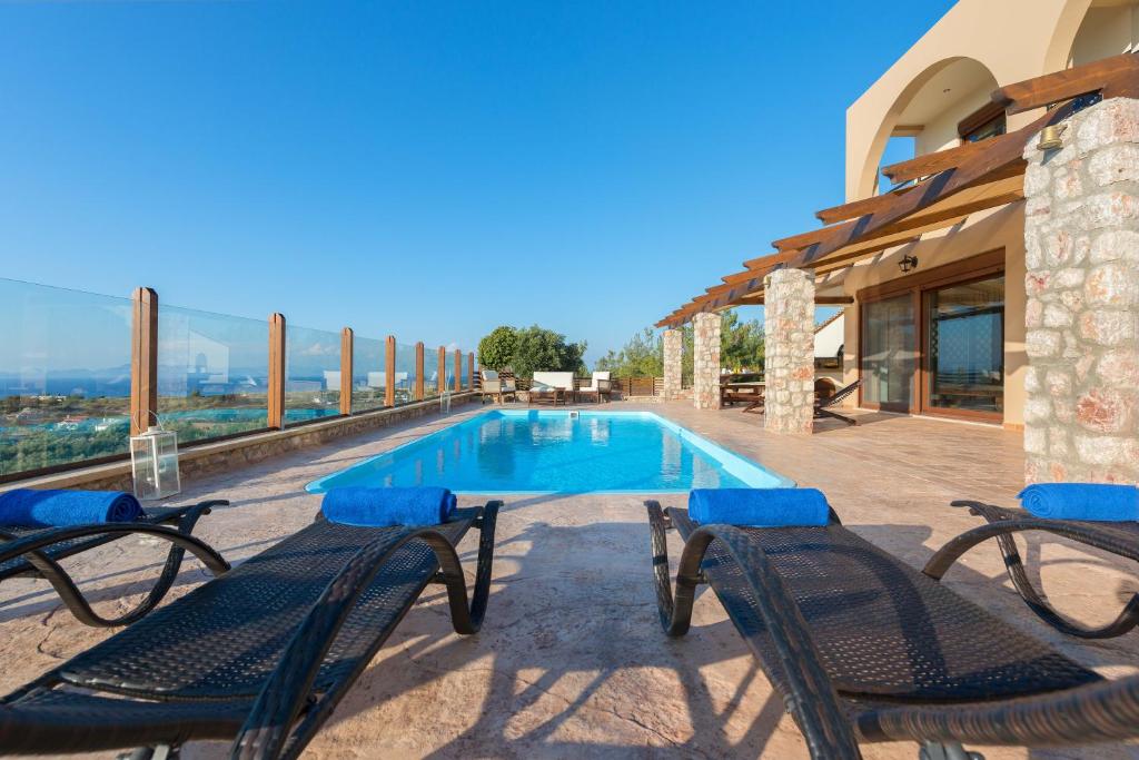 The swimming pool at or close to Butterfly Villa with stunning Sea and Valley Views