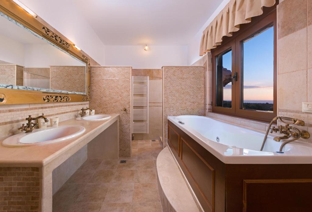 A bathroom at Butterfly Villa with stunning Sea and Valley Views