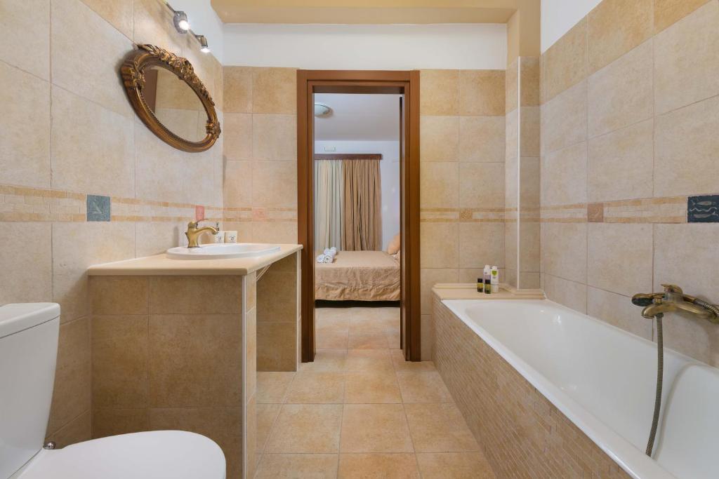 A bathroom at Butterfly Villa with stunning Sea and Valley Views