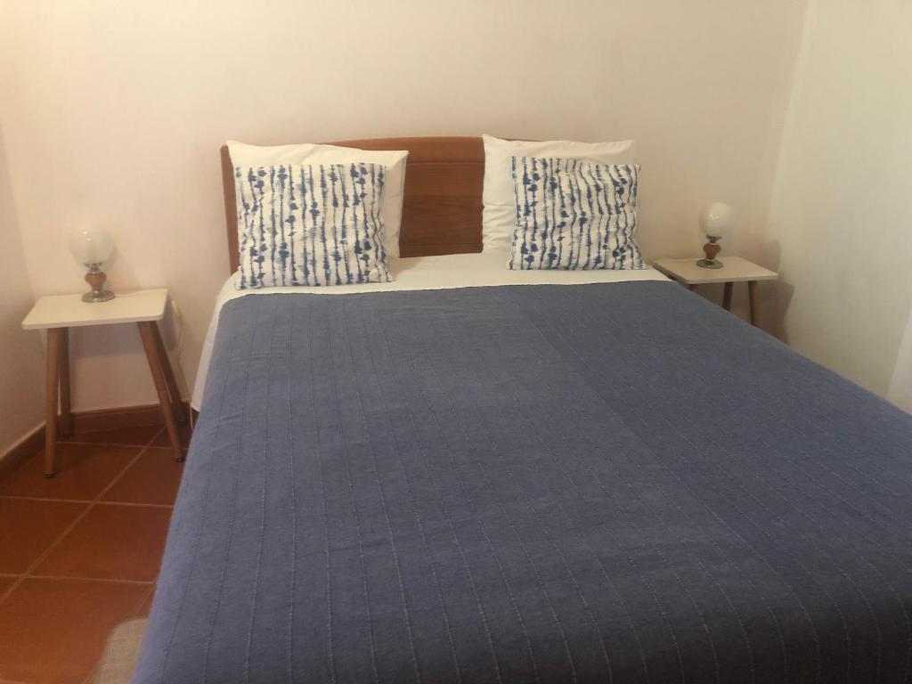 Кровать или кровати в номере Sudoeste Guest House