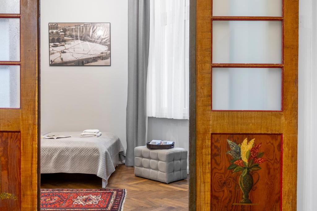 Posteľ alebo postele v izbe v ubytovaní Kurkowa Apartments