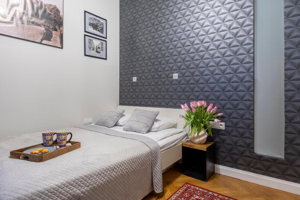 Posteľ alebo postele v izbe v ubytovaní Kurkowa Apartments