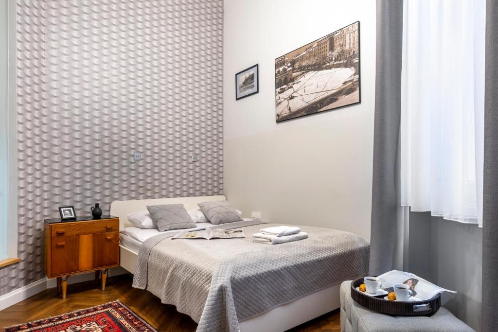 Posteľ alebo postele v izbe v ubytovaní Kurkowa Apartments