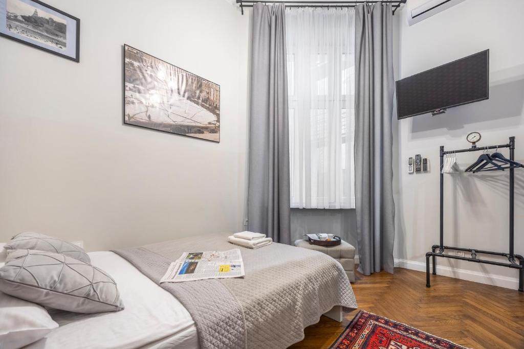 Posteľ alebo postele v izbe v ubytovaní Kurkowa Apartments