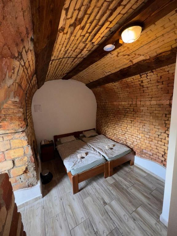 Postel nebo postele na pokoji v ubytování Ranč Vápenka