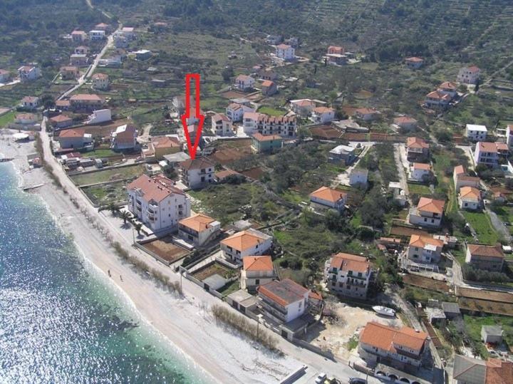 an aerial view of a beach with a red marker at Apartment Capitano in Slatine