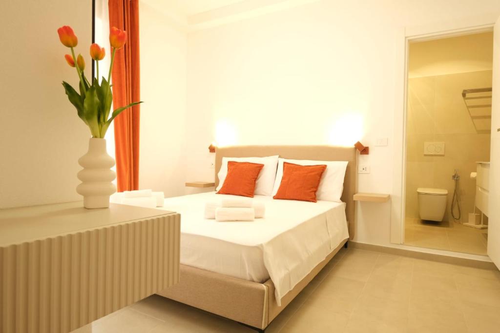 Postel nebo postele na pokoji v ubytování Marephis Rooms - Alghero