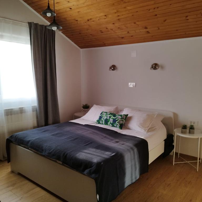 Posteľ alebo postele v izbe v ubytovaní Apartments Garden Zagreb